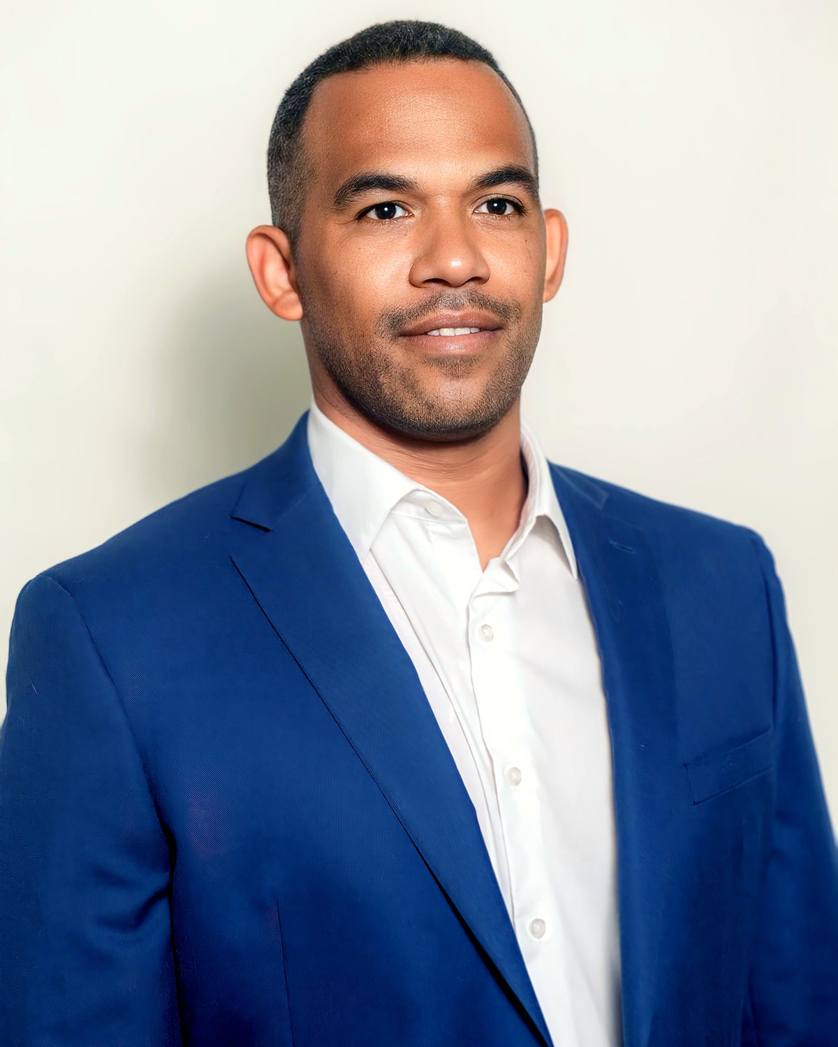 Miguel Bueno, SwornIn Mobile Notary, in a blue blazer